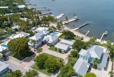 Aerial view of waterfront luxury homes in Tavernier, Florida